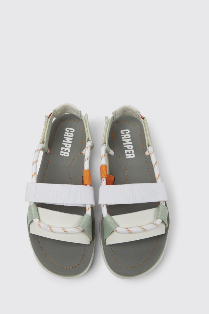 Overhead view of Oruga White, green, and orange sandals for women