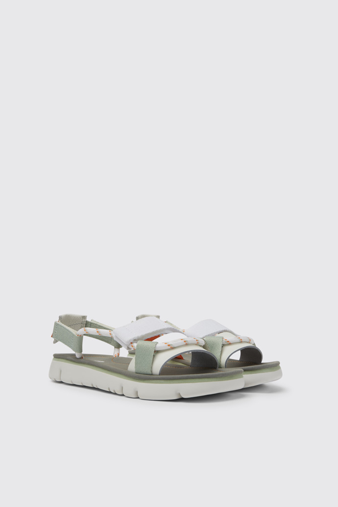 Front view of Oruga White, green, and orange sandals for women