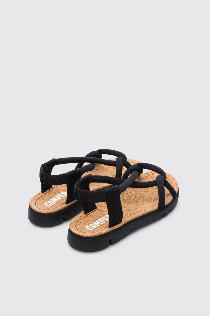 Back view of Oruga Black sandal for women