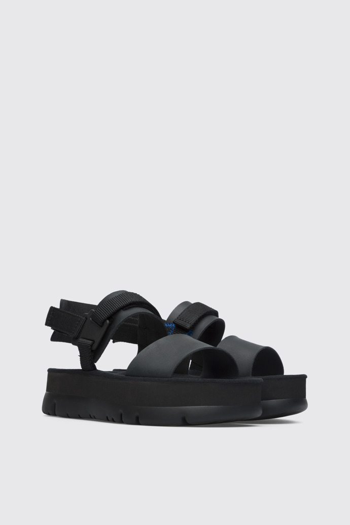 Front view of Oruga Up Black sandal for women
