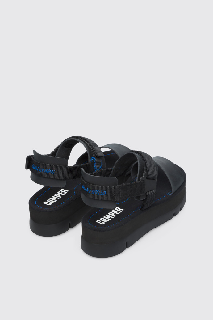 Back view of Oruga Up Black sandal for women