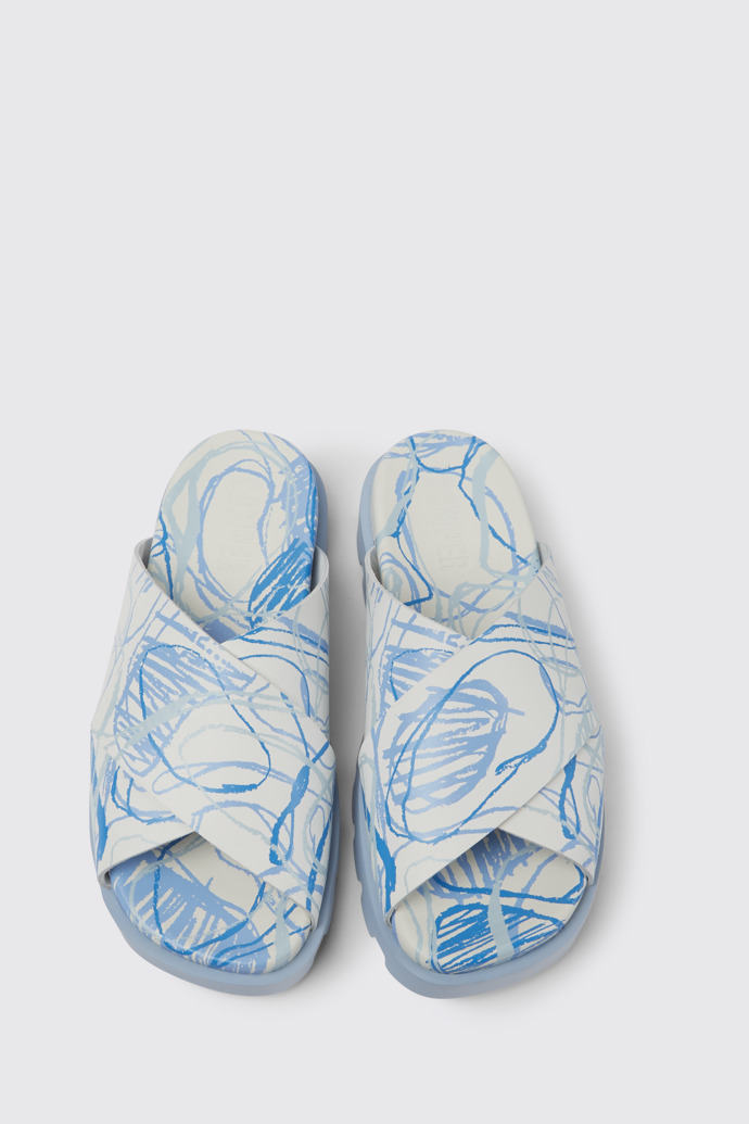 Overhead view of Brutus Sandal White and blue printed leather sandals for women
