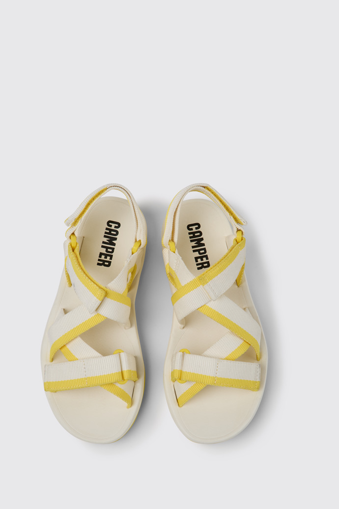 Overhead view of Match White and yellow recycled PET sandals for women