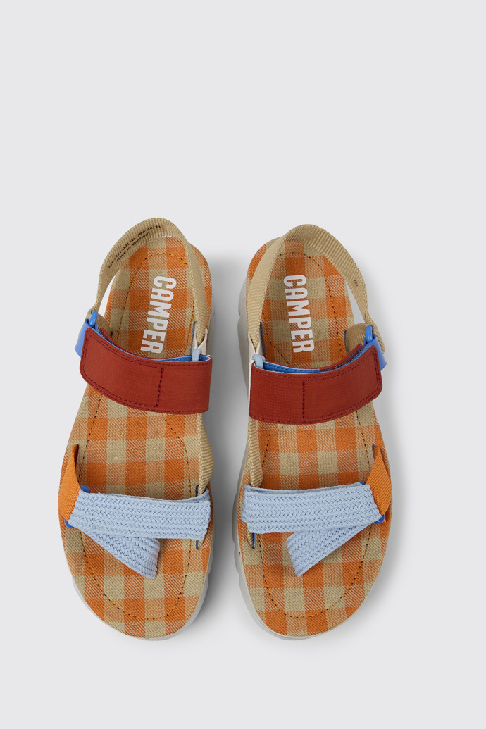 Overhead view of Oruga Up Beige, blue, and red sandals for women