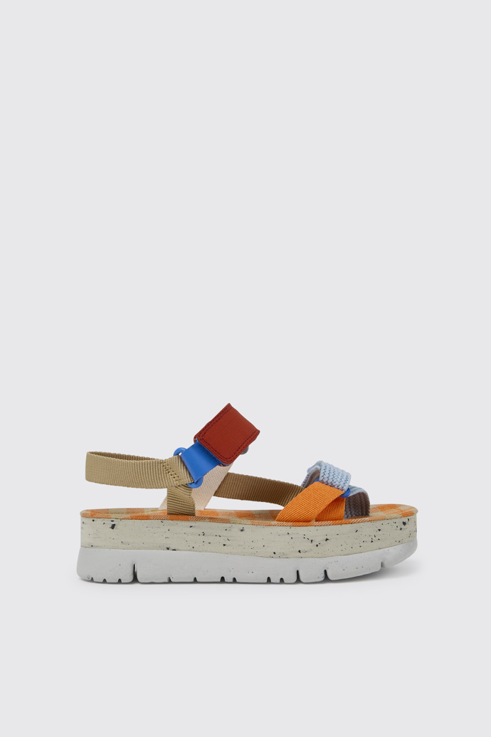 Side view of Oruga Up Beige, blue, and red sandals for women