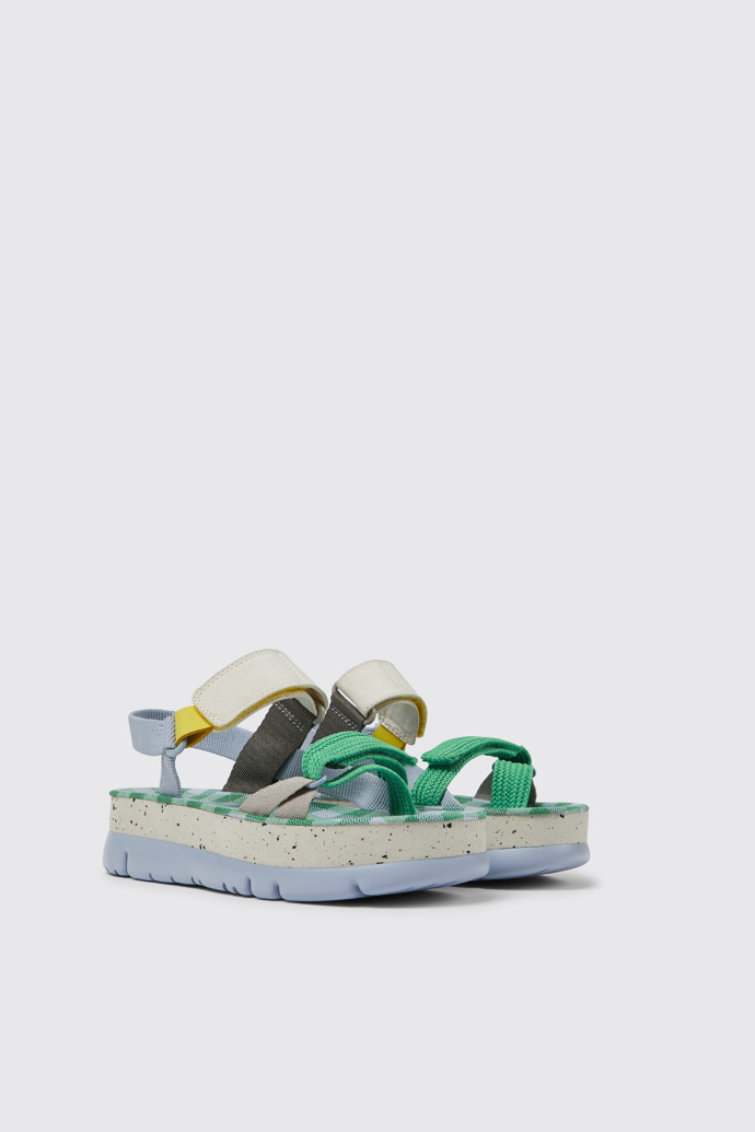 Front view of Oruga Up Blue, green, and grey sandals for women