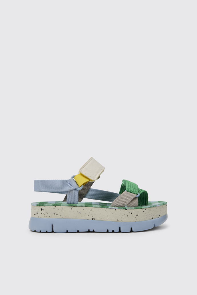 Side view of Oruga Up Blue, green, and grey sandals for women