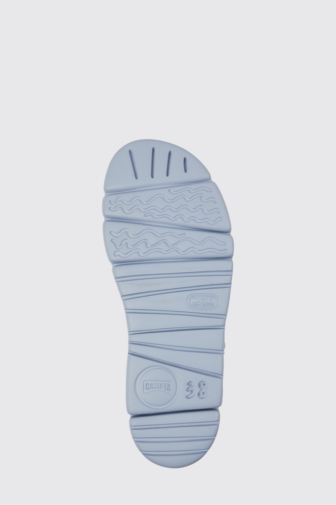 The sole of Oruga Up Blue, green, and grey sandals for women