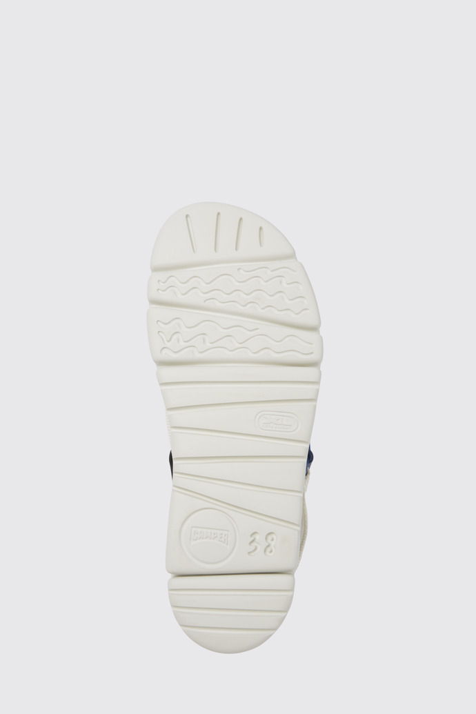 The sole of Oruga Up White, blue, and black sandals for women