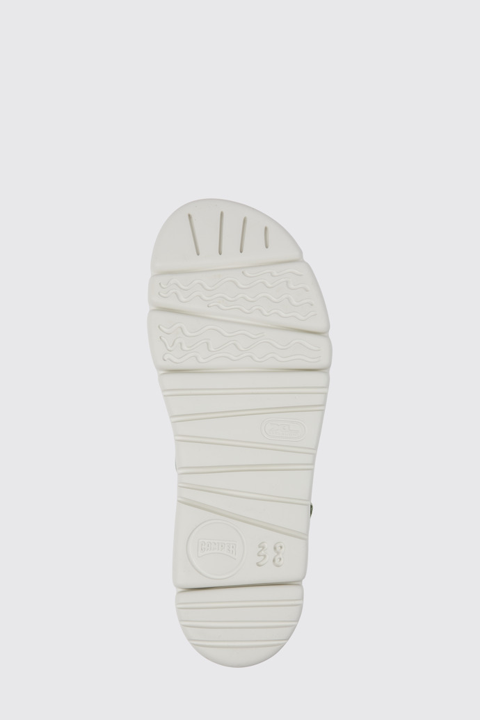 The sole of Oruga White, green, and grey sandals for women