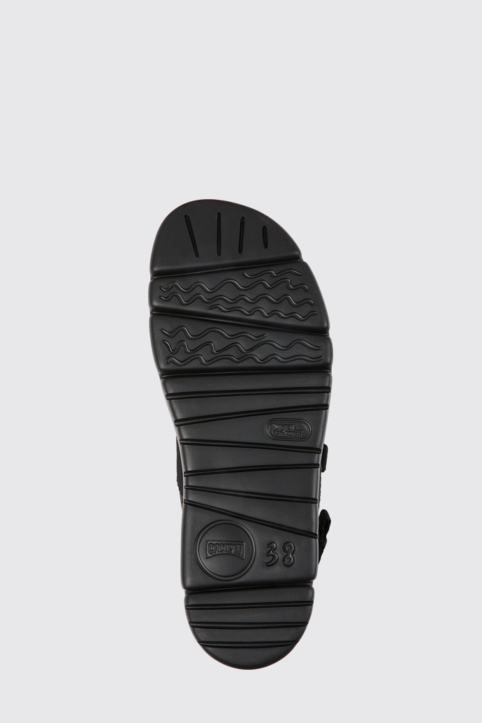 The sole of Oruga Black and grey sandals for women