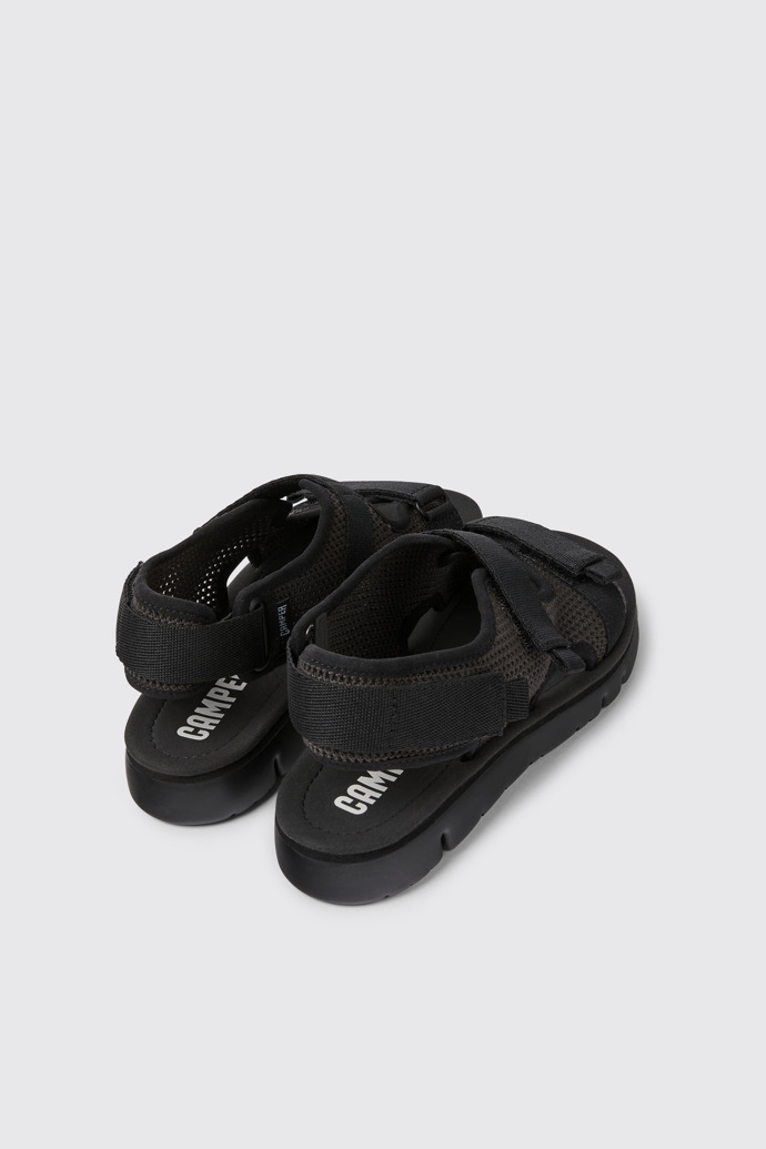 Back view of Oruga Black and grey sandals for women