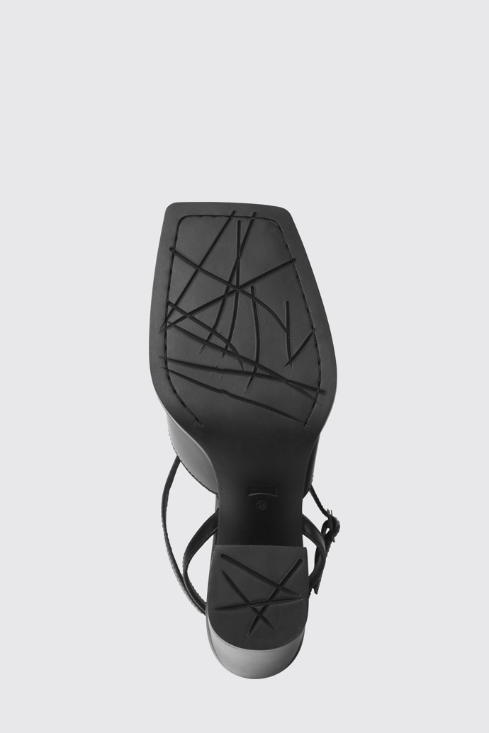 The sole of Karole Black leather T-bar shoes for women