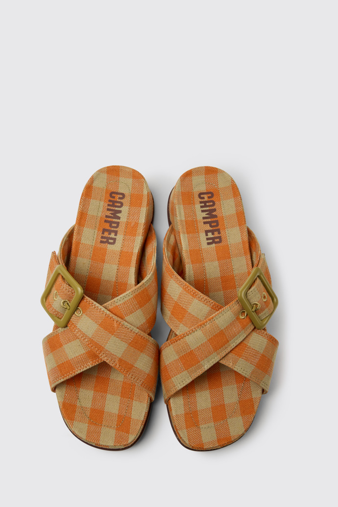 Overhead view of Atonik Orange and beige sandals for women