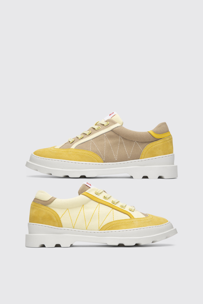 Side view of Twins Yellow and beige lace-up sneakers