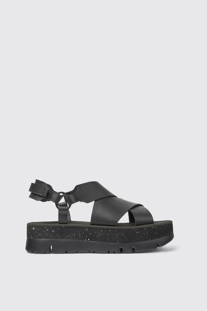Side view of Oruga Up Black leather sandals for women