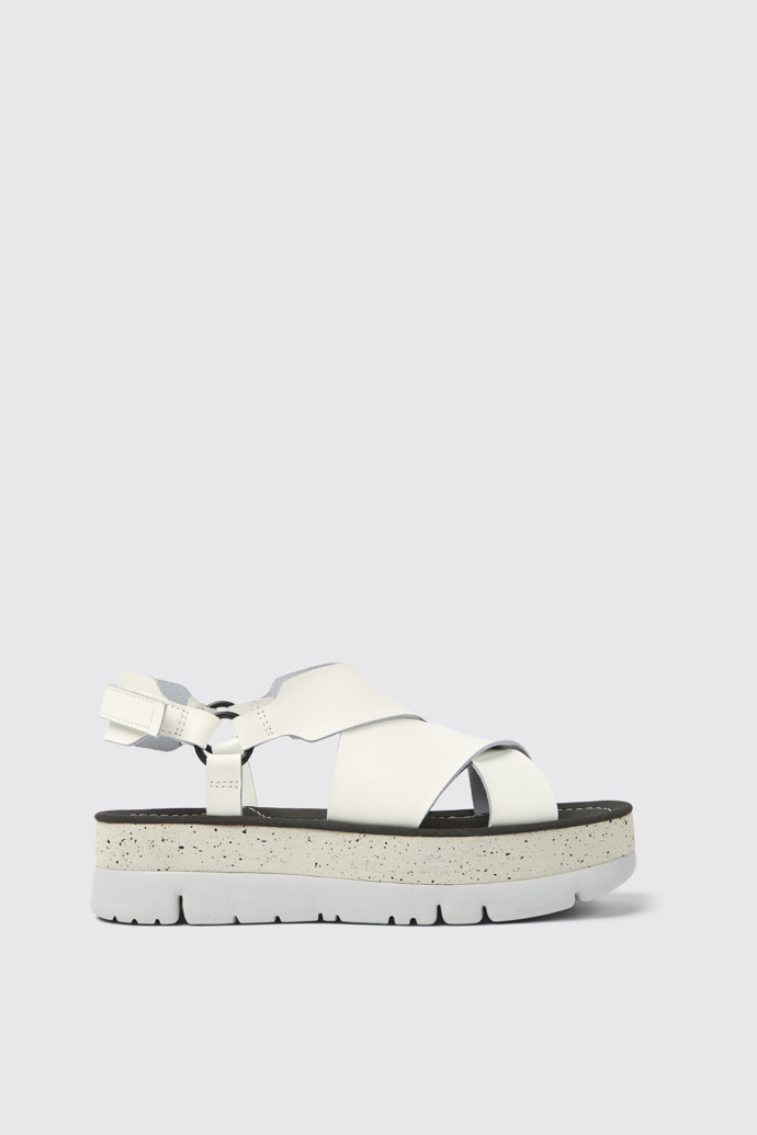 Side view of Oruga Up White leather sandals for women
