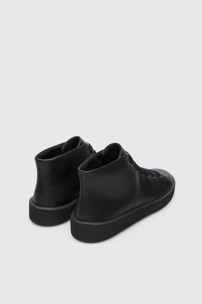 Back view of Courb Men's black ankle boot