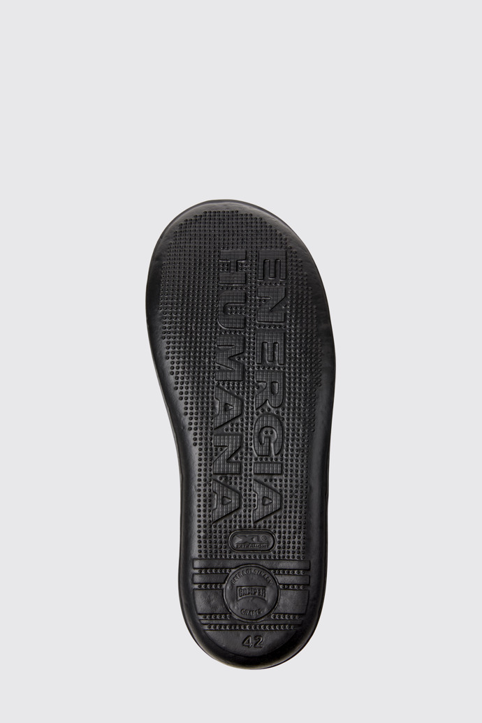 The sole of Beetle - HYDROSHIELD Black Leather Ankle Boots for Men.