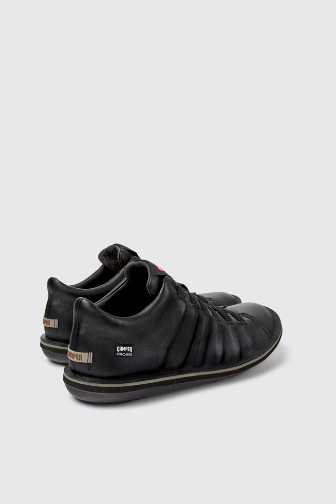 Back view of Beetle - HYDROSHIELD Black Leather Ankle Boots for Men.