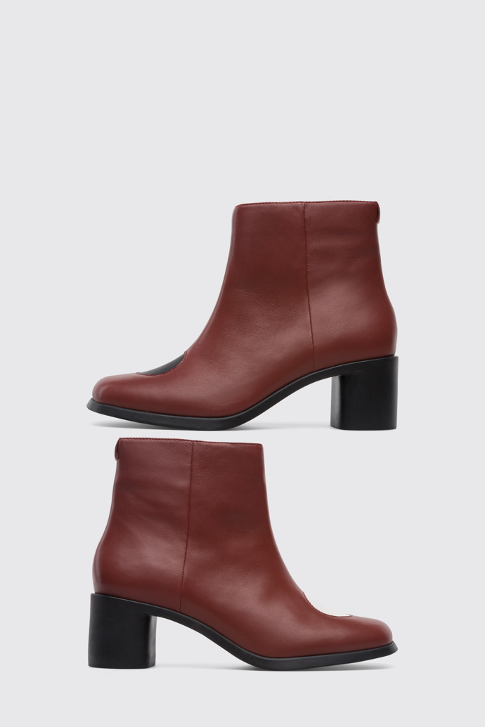Side view of Twins Multi-colored zip up ankle boot for women