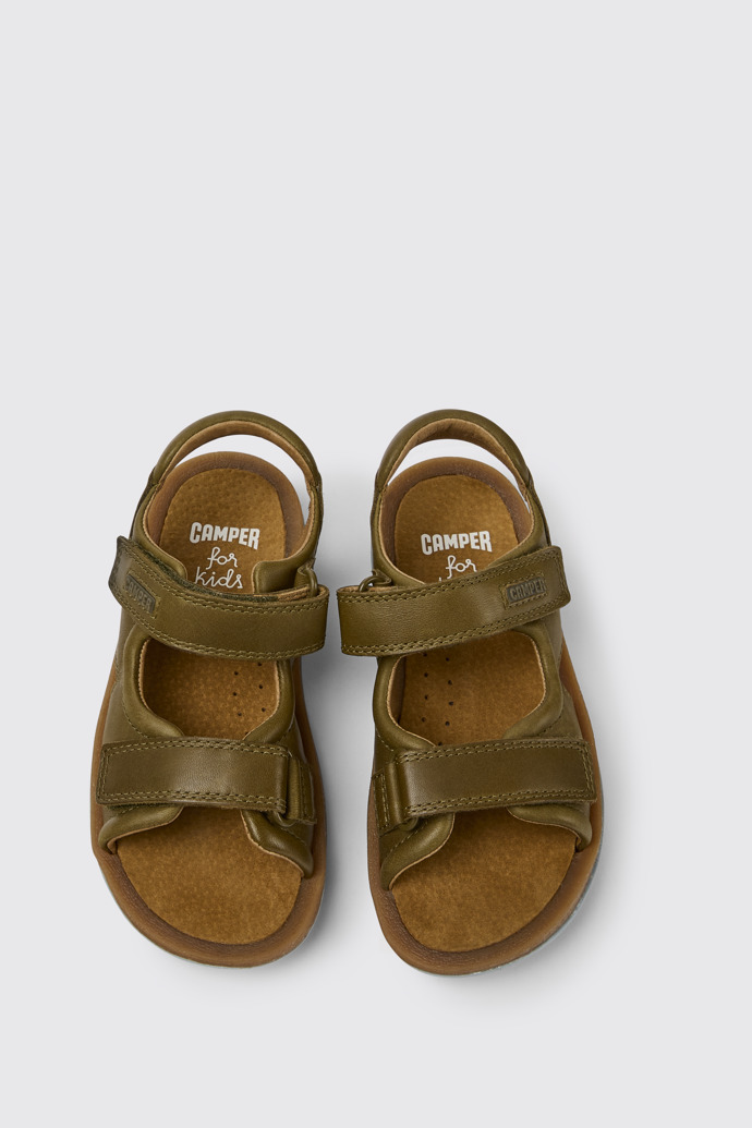 Overhead view of Bicho Green leather sandals for kids