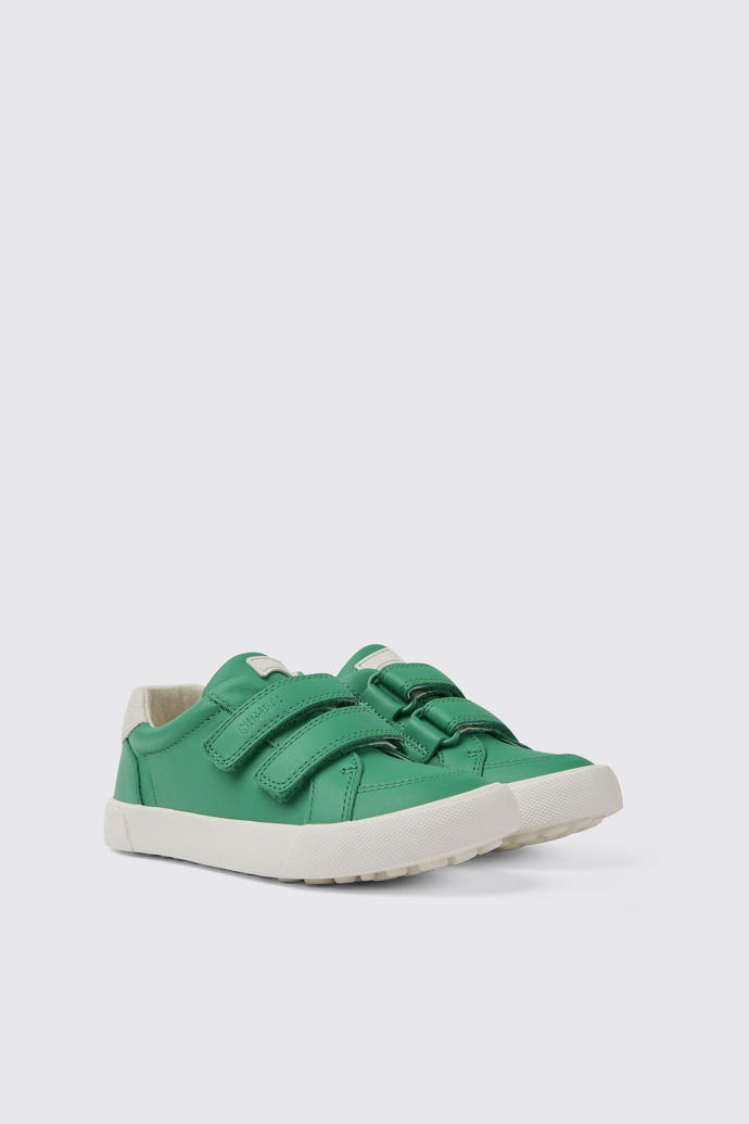 Front view of Pursuit Green and white sneakers for kids