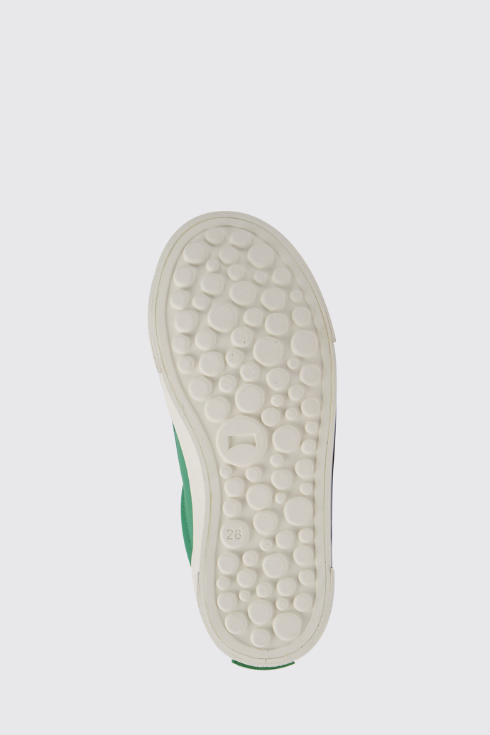 The sole of Pursuit Green and white sneakers for kids