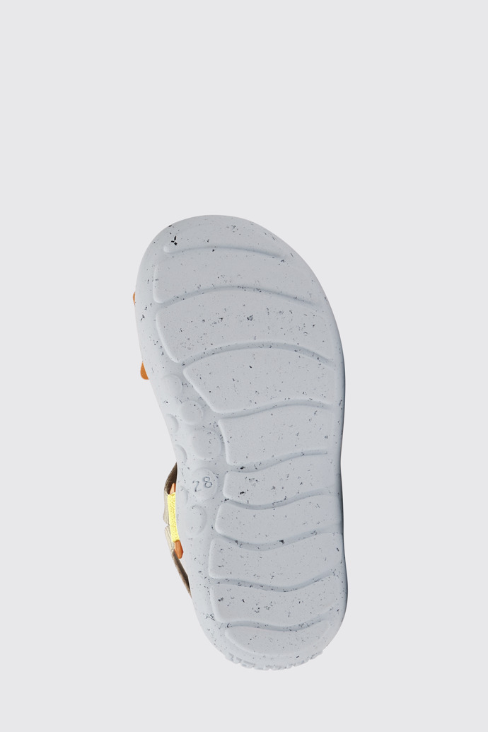 The sole of Wous Yellow, orange, and beige sandals for kids