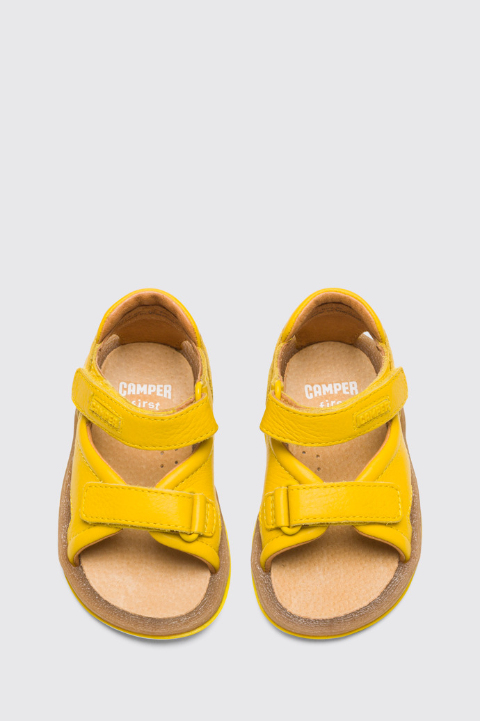 Overhead view of Bicho Yellow strappy kids’ sandal