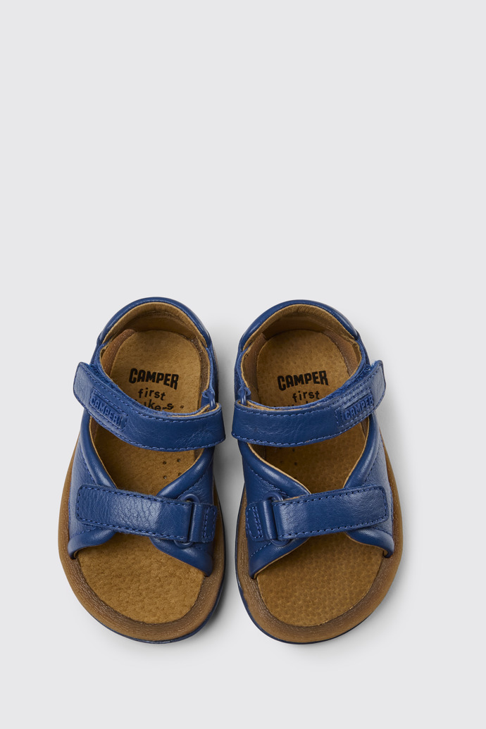 Overhead view of Bicho Blue leather sandals for kids