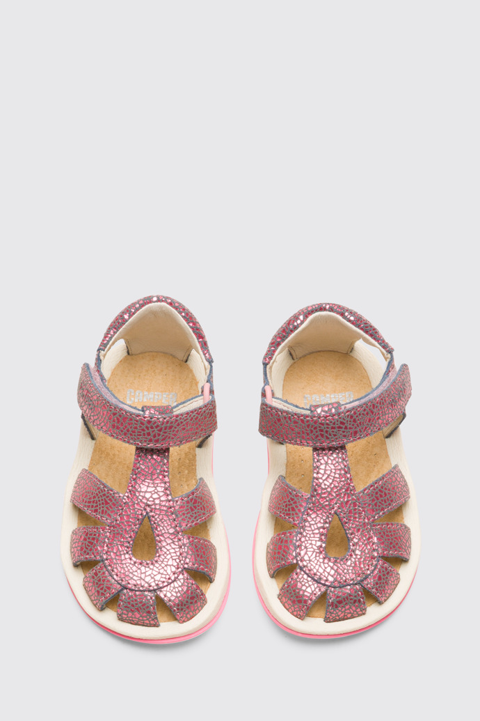 Overhead view of Bicho Closed pink T-strap kids’ sandal