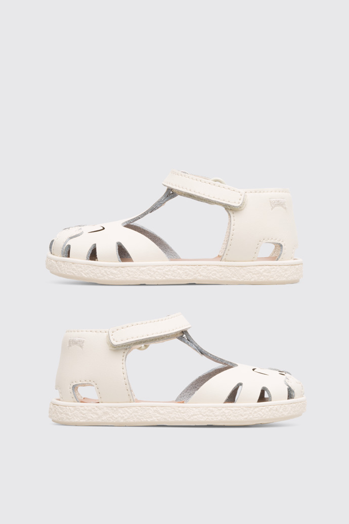 Side view of Twins Girl’s cream T-strap sandal