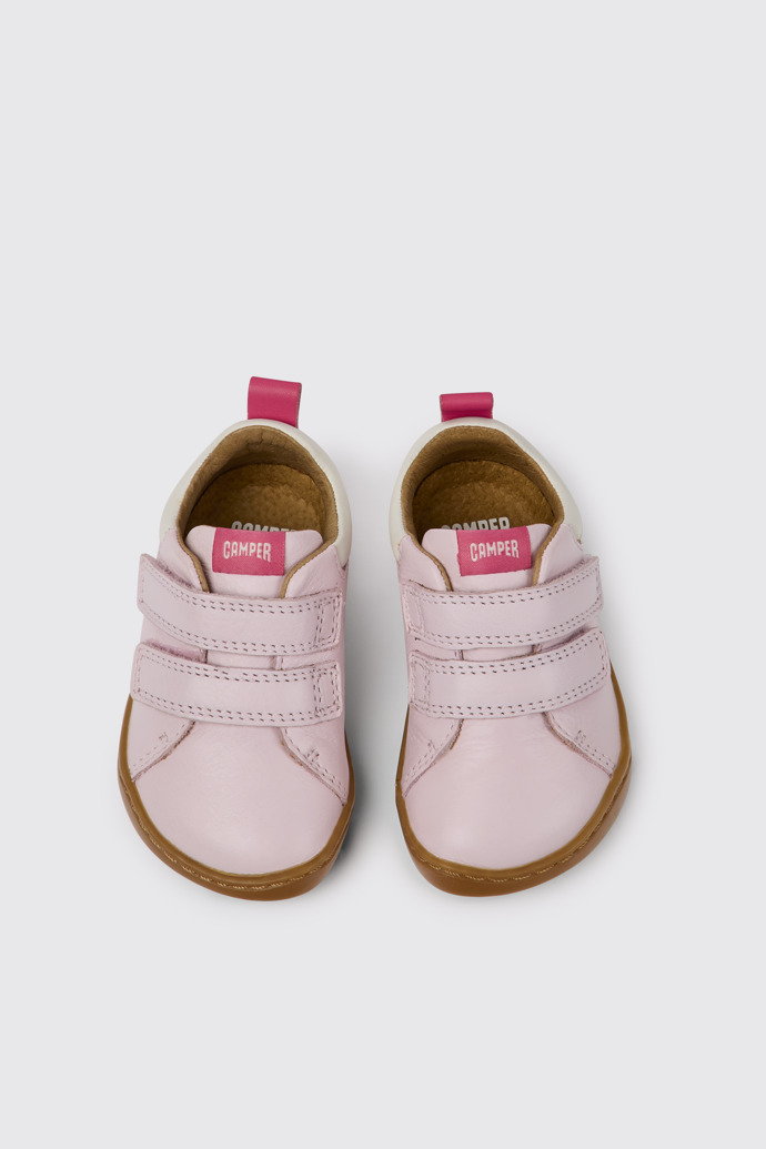 Overhead view of Peu Pink and white leather shoes for girls