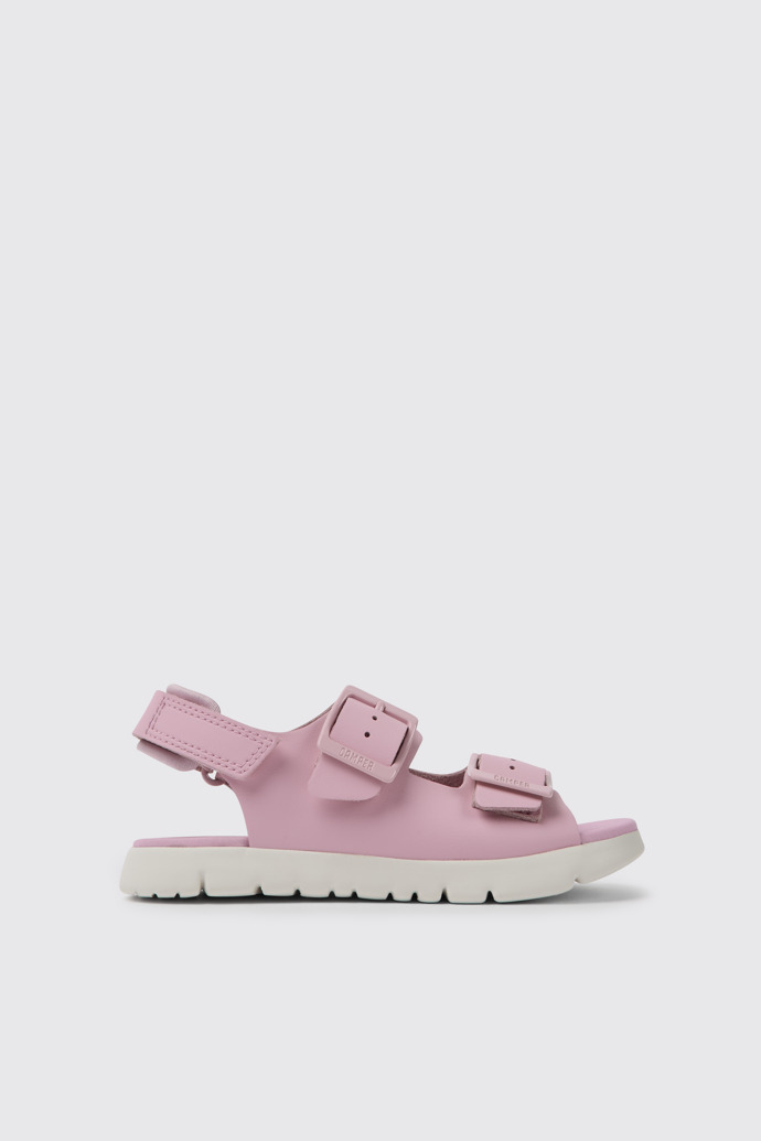Side view of Oruga Pink leather sandals for kids