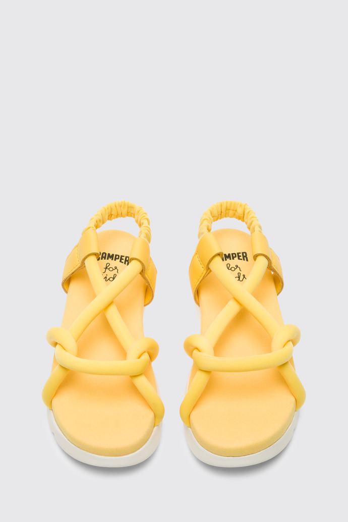 Overhead view of Oruga Yellow knotted sandal for kids