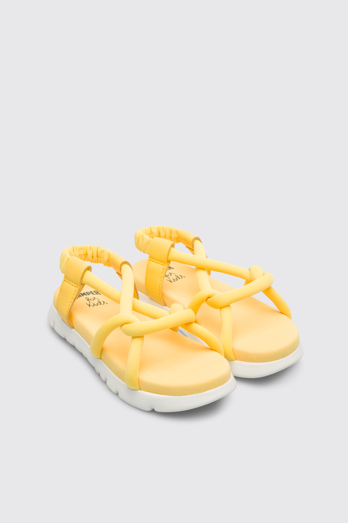 Front view of Oruga Yellow knotted sandal for kids