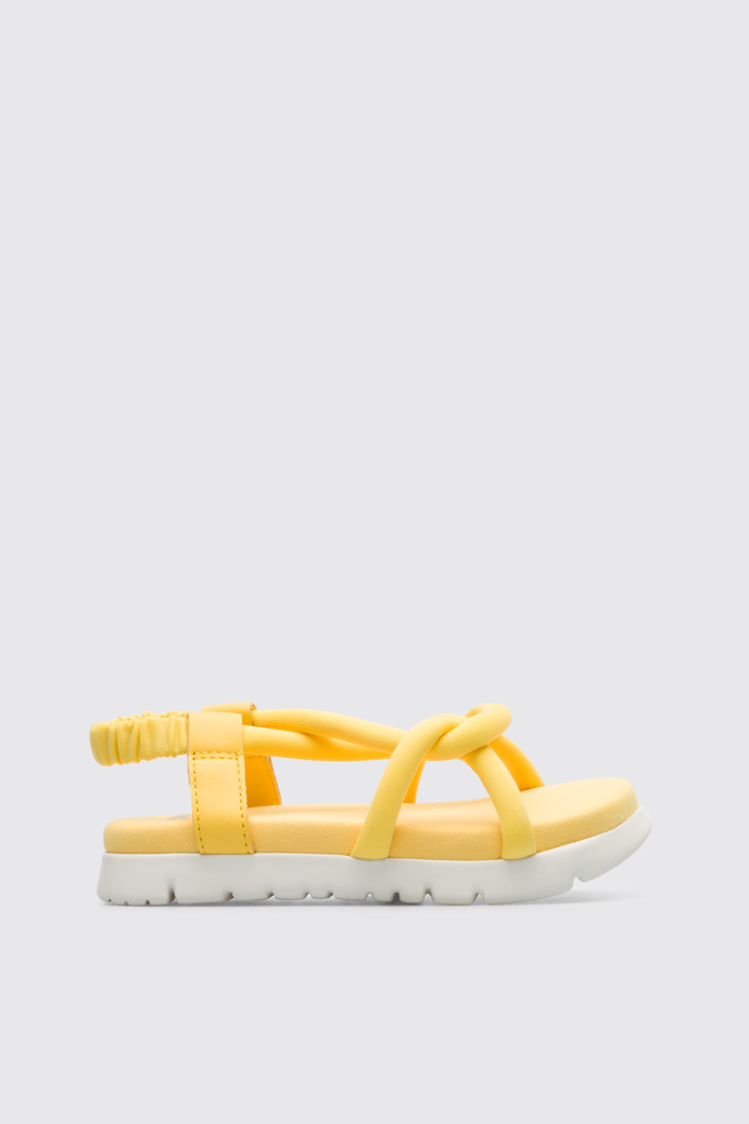 Side view of Oruga Yellow knotted sandal for kids