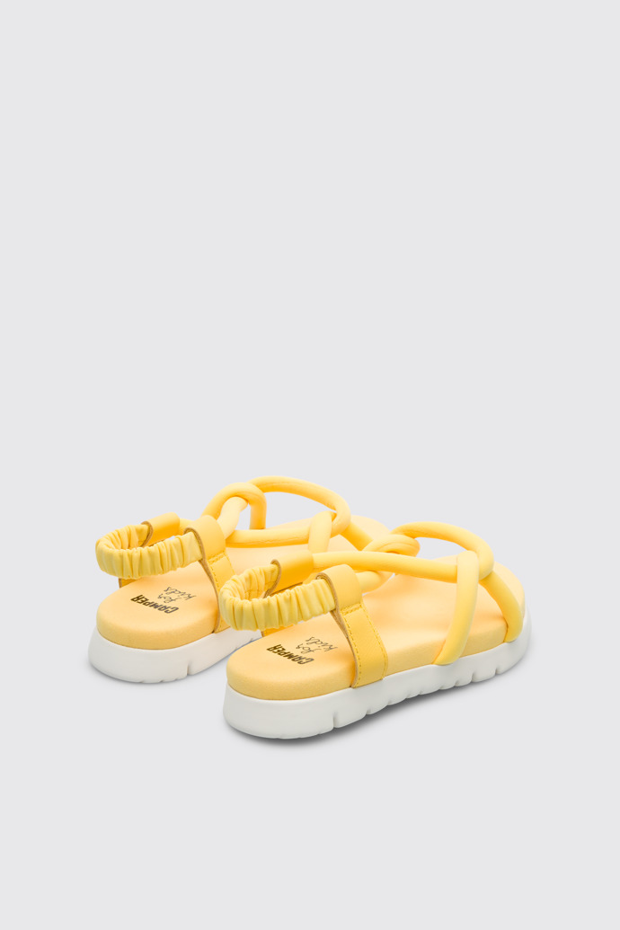 Back view of Oruga Yellow knotted sandal for kids