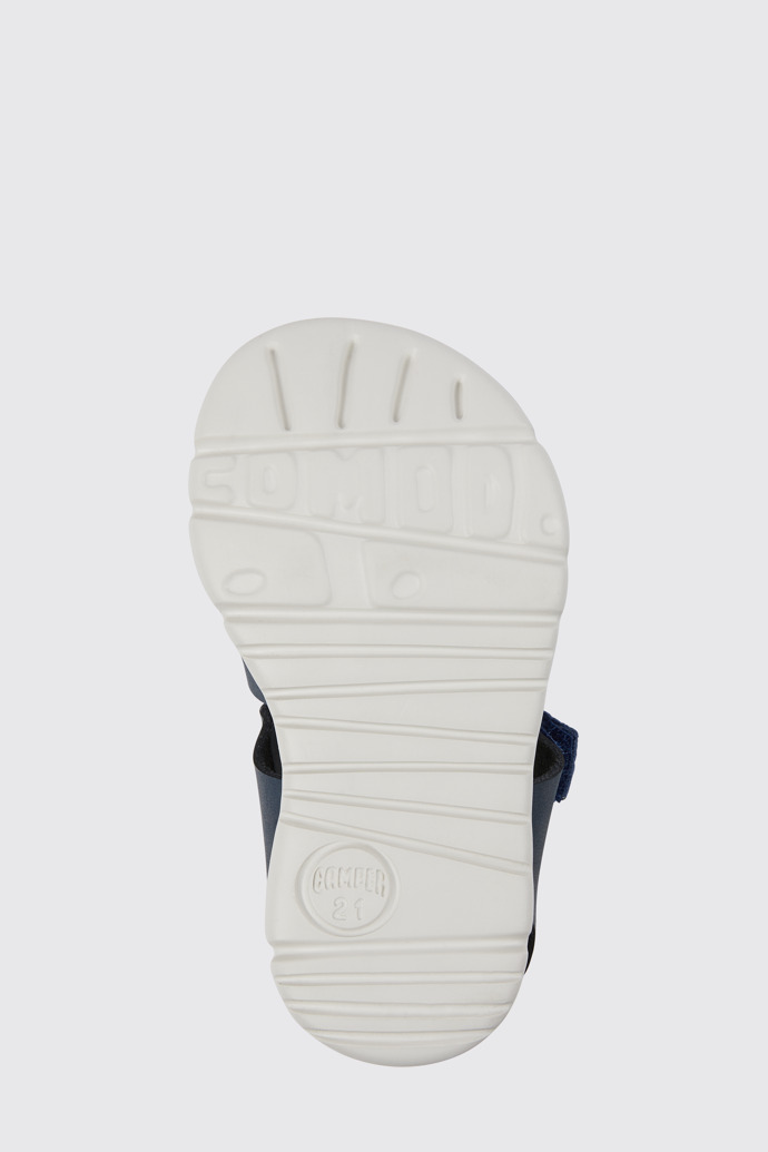 The sole of Oruga Blue leather and textile sandals
