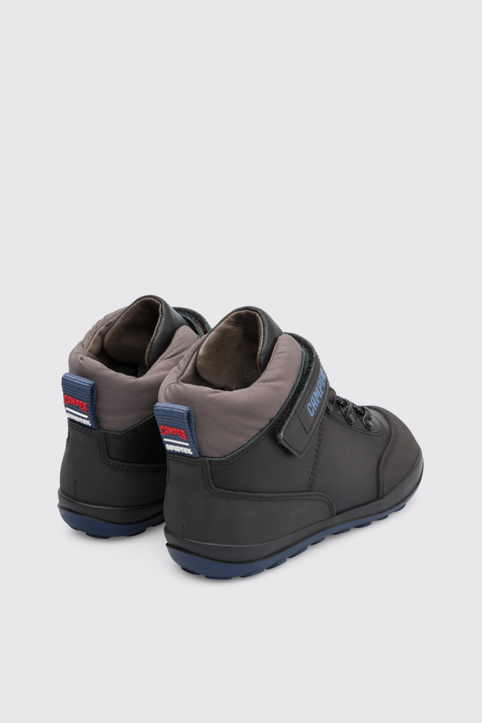 Back view of Peu Pista Waterproof black ankle boot for boys