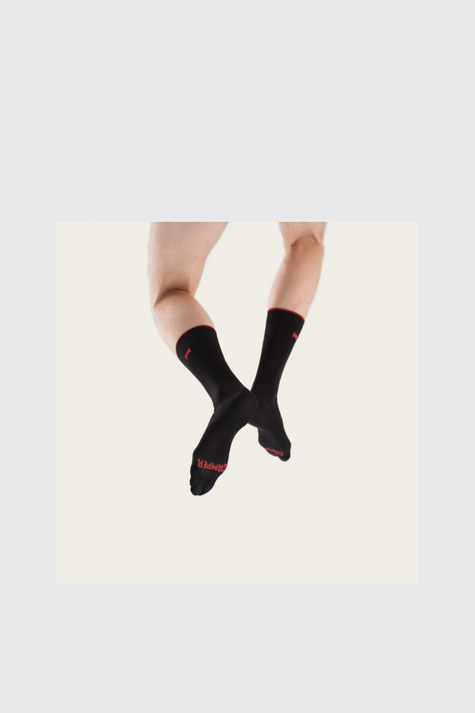 A model wearing Basic Sox Black Socks for Unisex