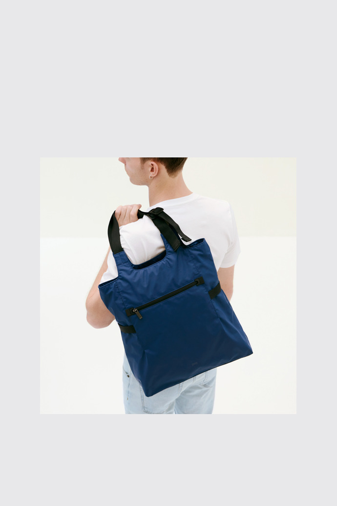 A model wearing Naveen Blue Shoulder Bags for Unisex