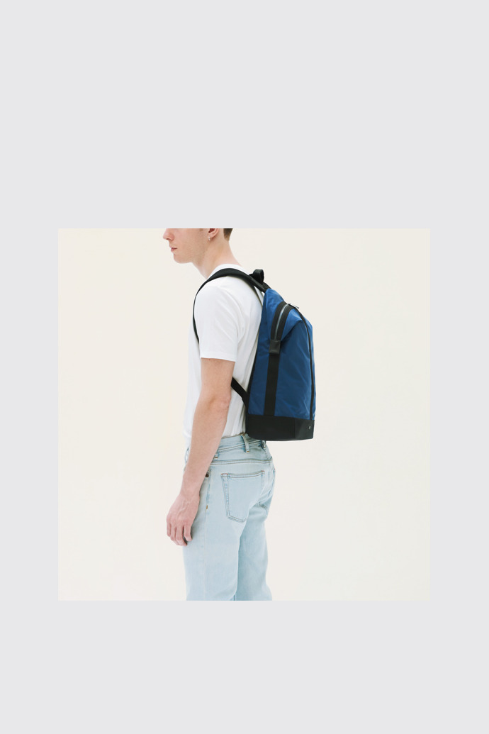 A model wearing Moon Blue Backpacks for Unisex