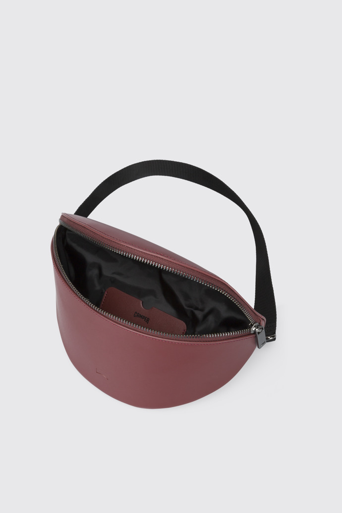 Overhead view of Mosa Small unisex shoulder bag in burgundy