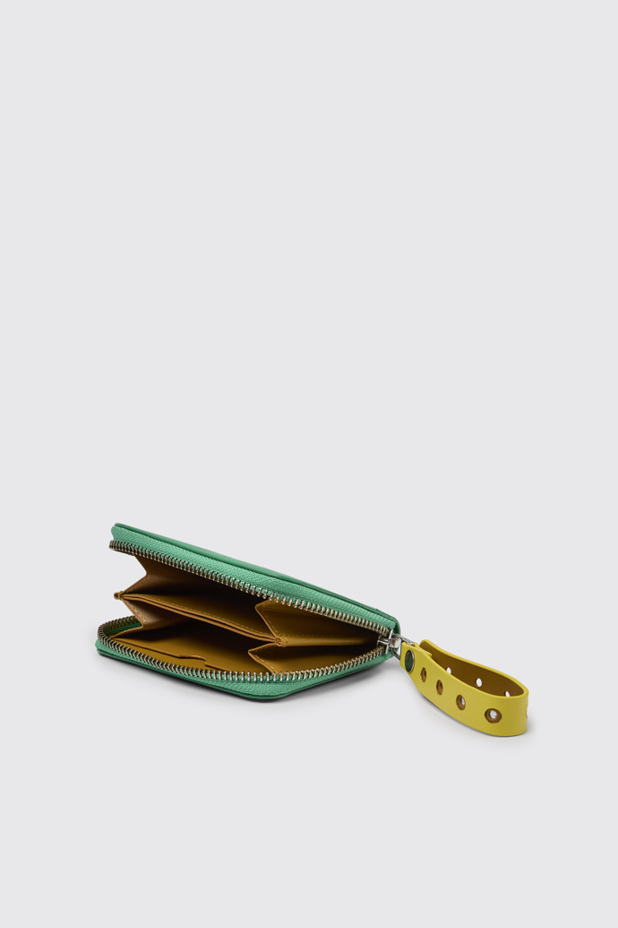 Overhead view of Mosa Green and yellow small leather wallet
