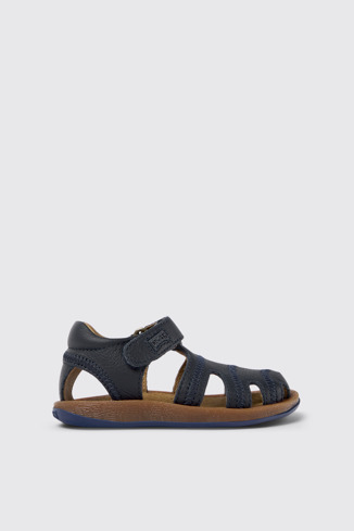 Side view of Bicho Closed navy T-strap sandal for kids