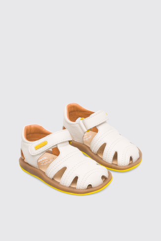 Front view of Bicho Closed cream T-strap sandal for kids