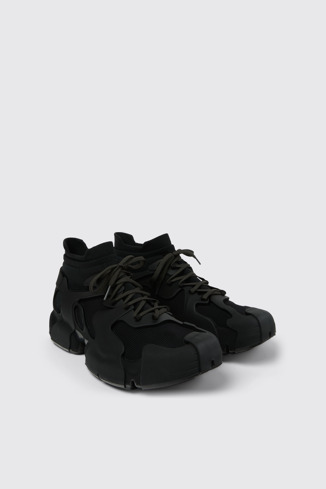Front view of TOSSU Black Caged Sneakers