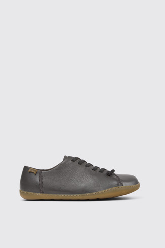 Peu Chaussures en cuir gris pour homme.